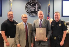 Pictured left to right: Sgt. Andrew Fondas, Frank Rotondo- Executive Director of GACP, Mayor Mike Davis, Chief Billy Grogan 